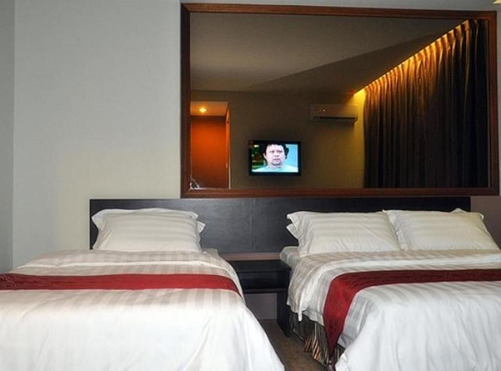 Goldenhill Hotel Kota Kinabalu Quarto foto